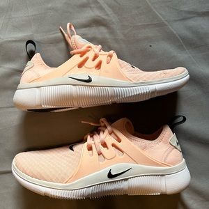 Nike Womens running/walking shoes. Size 11 pastel pink / peach